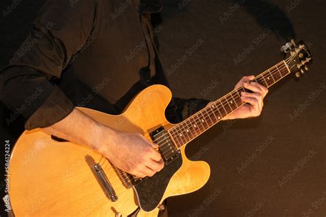 Artist is playing with a Gibson ES-335 electric guitar Stock Photo ...