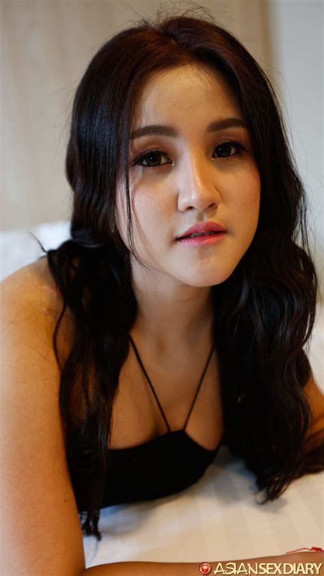 Beautiful Asian Girl Zin Shows Her Big Tits While Undressing For POV Sex NakedPics