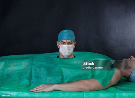 Funny Surgery Operation On A Black Background Stock Photo Download