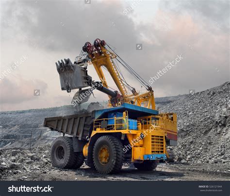 Stock Photo Loading Of Iron Ore On Very Big Dump Body Truck