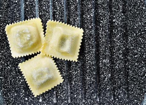 Premium Photo Uncooked Ravioli On Plate