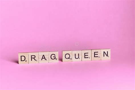 Drag Queen Words Represented By Wooden Letter Tiles Isolated On Colour