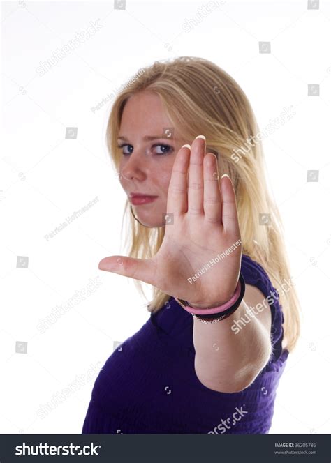 Blonde Girl Holding Hand Up Saying Stop Stock Photo 36205786