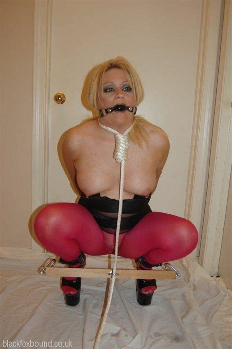 Hot Chick In Leggings With A Rope Around Neck Photos