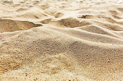 Premium Photo | Sand dunes in the desert or on the beach in closeup in