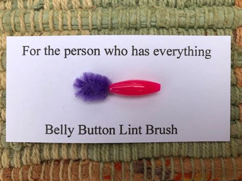 You Can Get A Belly Button Lint Brush For The Person Who Has Everything