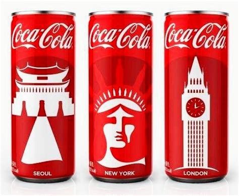 Three Cans Of Coca Cola Each With An Image Of The Statue Of Liberty