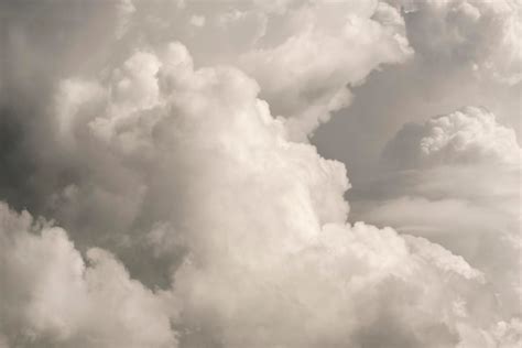 Premium Photo | White fluffy clouds background