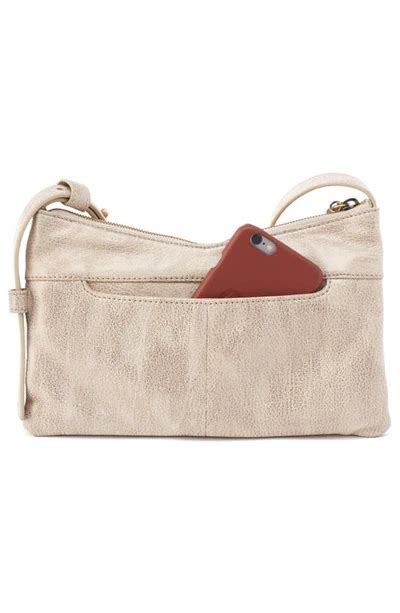 Hobo Paulette Small Leather Crossbody Bag In Gold Modesens