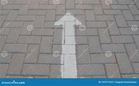 Arrow On The Asphalt Footpath Surface Symbol Concept Direction Stock