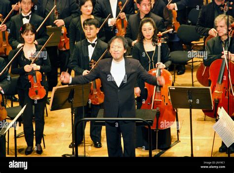 PARIS, France - South Korean conductor Chung Myung Whun (C) receives ...