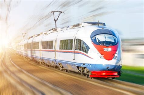 High-speed Passenger Train Rushing through Rail in Europe. Stock Photo ...