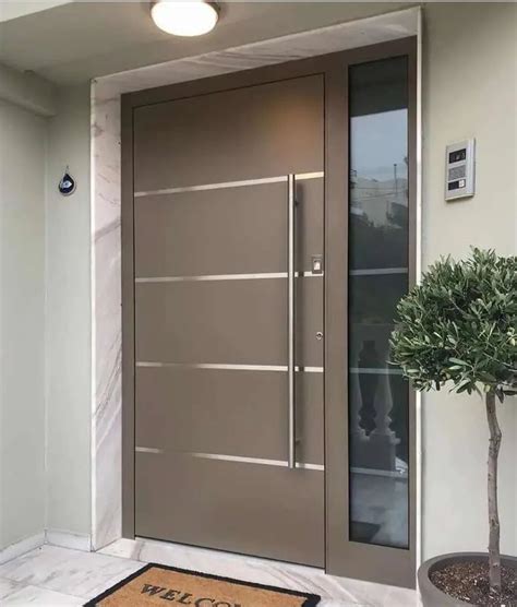 An Entrance With A Door And Potted Plant