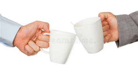 Manos De Los Socios Comerciales Que Sostienen Las Tazas De Caf Foto De