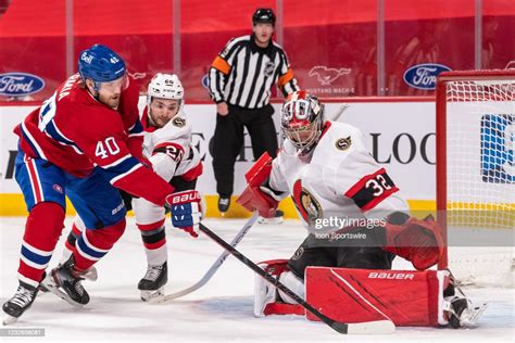 Filip Gustavsson of the Ottawa Senators makes the save against Joel ...