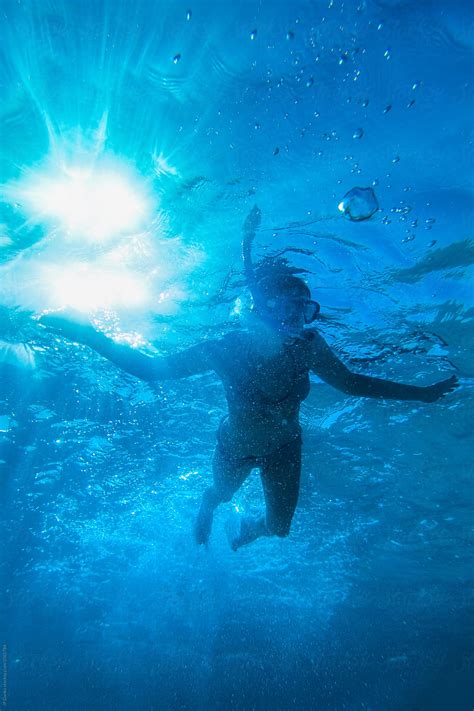 "Silhouette Of Woman Swimming Underwater At All Inclusive Caribbean ...