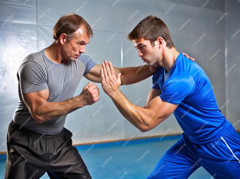 Premium Photo | A sportsman teaching Slap Fighting