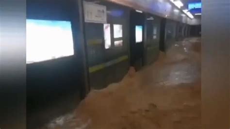 China flooding: Floodwater surges through subway in Zhengzhou | World ...