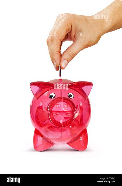 Woman S Hand Putting Coin Into Piggy Bank Isolated On White With Path