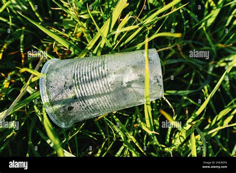 Plastic Cup Pollution On A Meadow Stock Photo Alamy