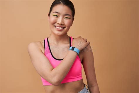 Woman Wearing Smart Watch Standing And Smiling After Checking Her