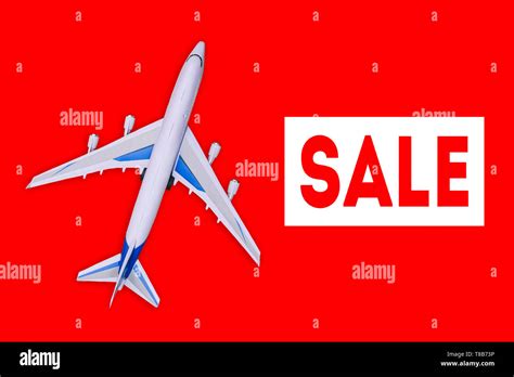 Passenger Aircraft On A Red Background Sale Of Air Tickets And Travel