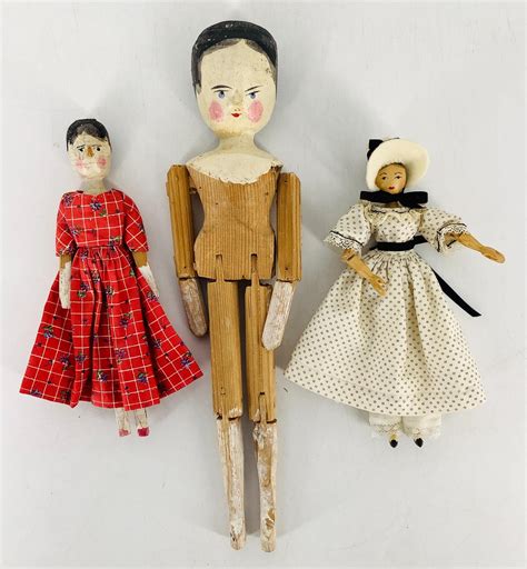 Lot Lot 3 Peg Wooden Dolls Includes Two Vintage 7 And 11 1 2 Crudely Carved Dolls And 6