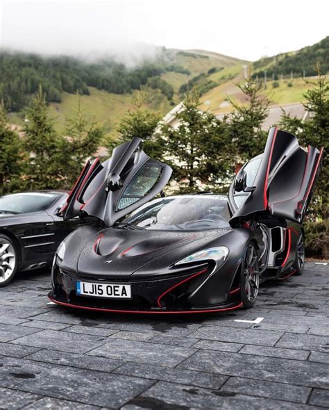 McLaren P1 painted in Matte Black w/ Red accents and exposed carbon ...