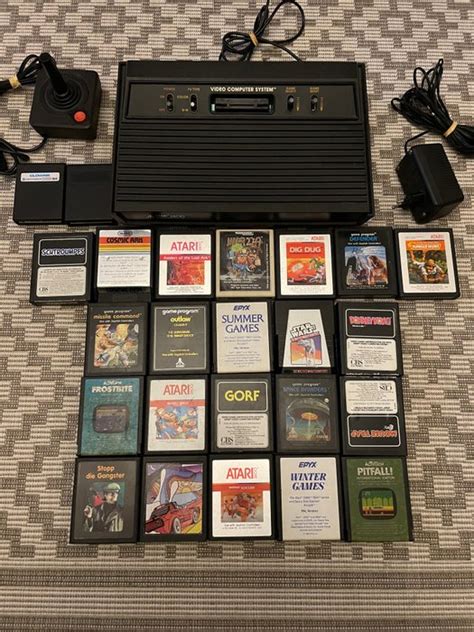 1 Atari 2600 - Console with games (24) - Catawiki