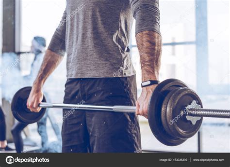 Sportsman Lifting Barbell Stock Photo Arturverkhovetskiy