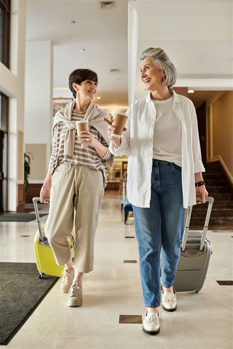 Two Senior Lesbian Partners Stroll Through Stock Image Image Of Exploring Journey