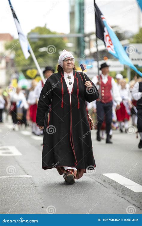 Estonian People in Traditional Clothing Walking the Streets of Tallinn ...