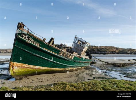 Old Wrecked Fishing Boat On The Donegal Coast In Ireland Stock Photo