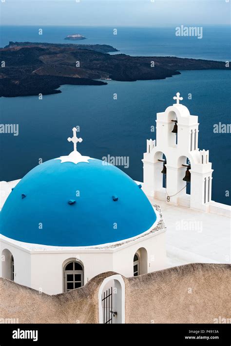 The Three Bells Of Fira With Blue Dome A Greek Orthodox Church On The