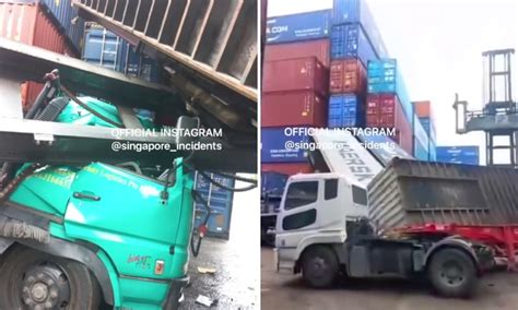 Prime mover driver nearly crushed as container stacker topples onto his ...