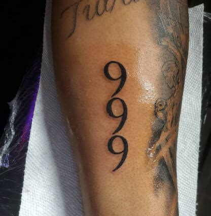 Decoding the Symbolism: The Meaning Behind 999 Number Tattoos - Psycho Tats