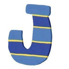 The Letter J Is Made Up Of Blue And Yellow Striped Material With