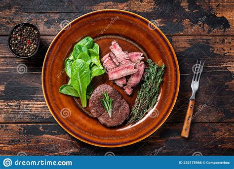 Fillet Mignon Tenderloin Roast And Cut Meat Beef Steaks In A Plate With