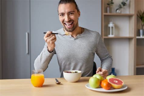 Cheerful Guy Having Healthy Breakfast Stock Image - Image of horizontal ...