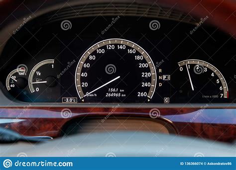 Close Up Of A Dashboard With Elements Of A Tree In A Car S Design With