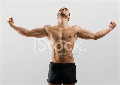 Bodybuilder With Perfect Abs Shouldersbiceps Triceps Flexing Stock