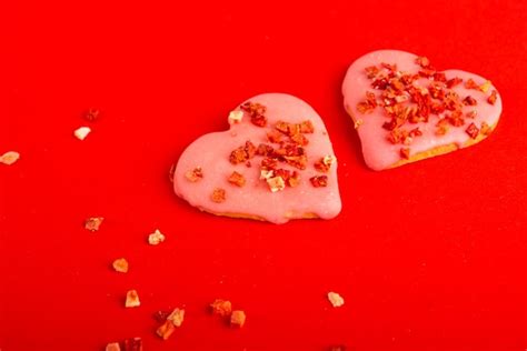 Premium Photo | Two cookies heart shaped for valentine's day