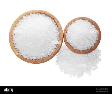 Wooden Bowls And Heap Of Natural Sea Salt Isolated On White Top View