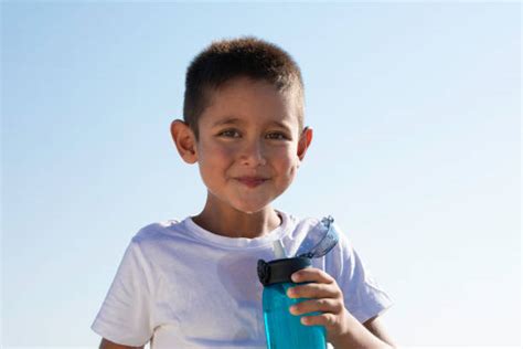 2,000+ Boy Drinking Water Bottle Stock Photos, Pictures & Royalty-Free Images - iStock