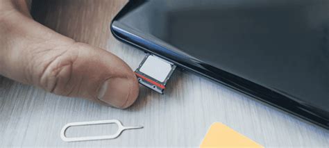 how to open sim card slot iphone