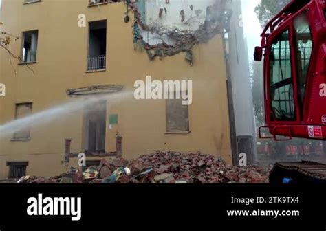 Destruction Of A Structure With Mechanical Excavator On A Building Site