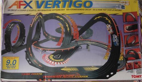 Troc Echange Lot Circuit Voitures Tomy AFX Vertigo Circuit Train