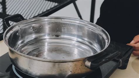 Asian Spicy Instant Noodles Soup Cooking In Hot Pot With Chopsticks
