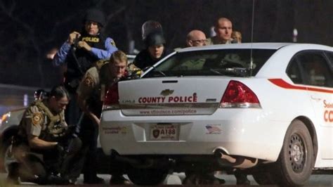 Ferguson Police Shot During Protest Bbc News