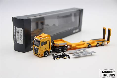 Herpa MAN TGX GM 33 580 Goldhofer Sattelzug Gelb Nr 954679 1 87